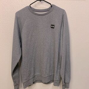 This is a men’s under Armour sweater, casual or formal!